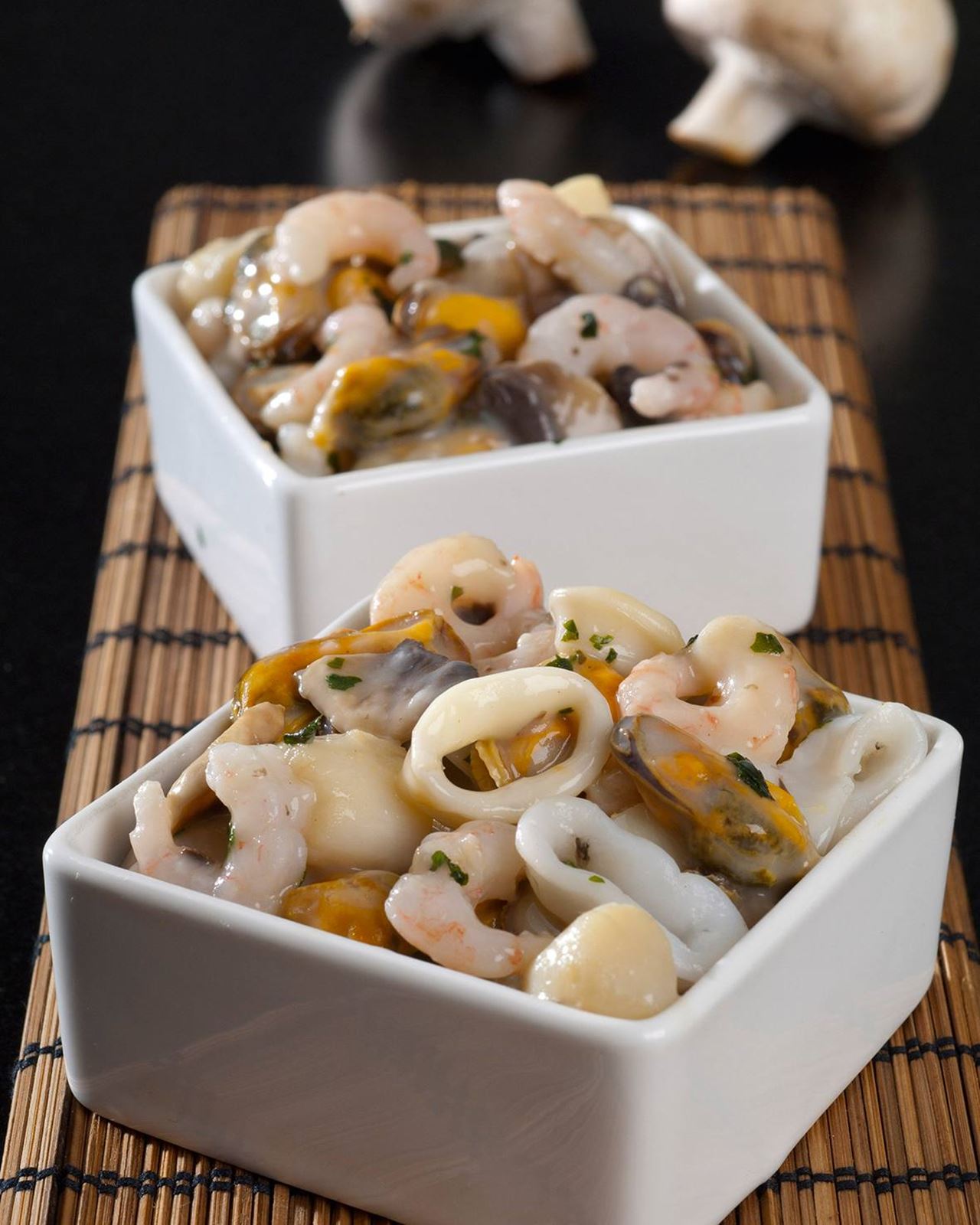 recipe image Cassolette de fruits de mer aux champignons de Paris